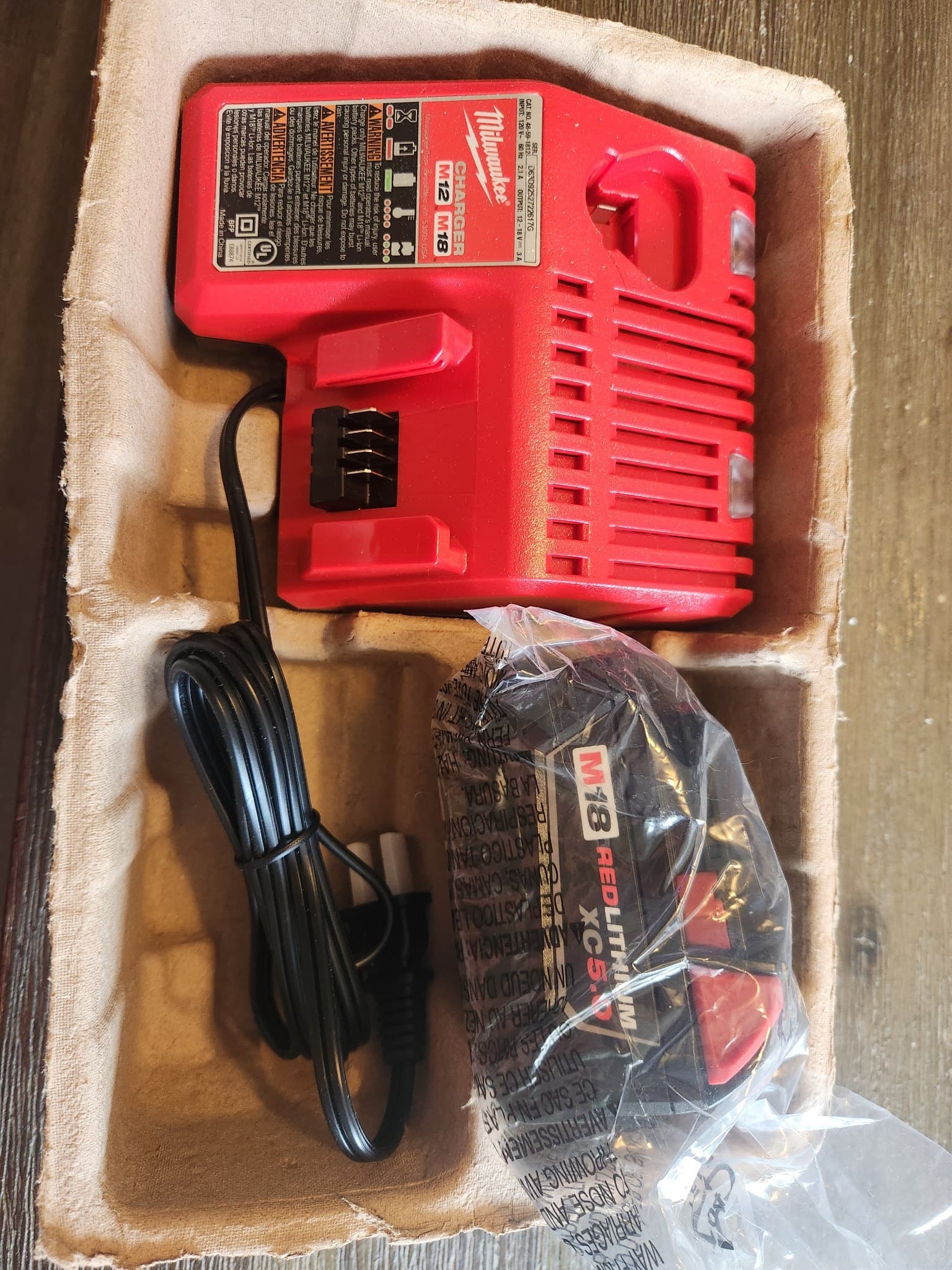 Milwaukee M18 5ah battery and charger